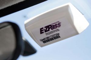 Electronic toll payment badge subscription for individuals