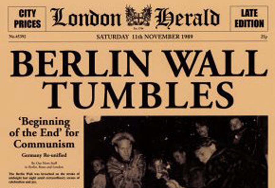 https://travelersunited.org/wp-content/uploads/BerlinWall-Newspaper.jpg